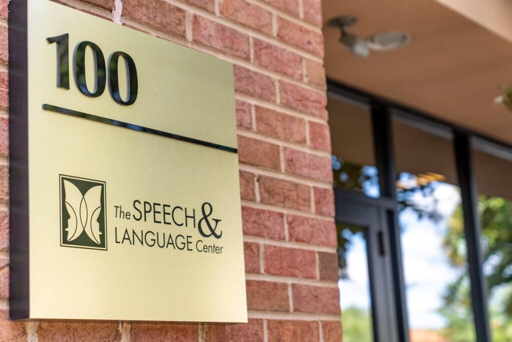 Suite 100 sign with The Speech & Language Center logo